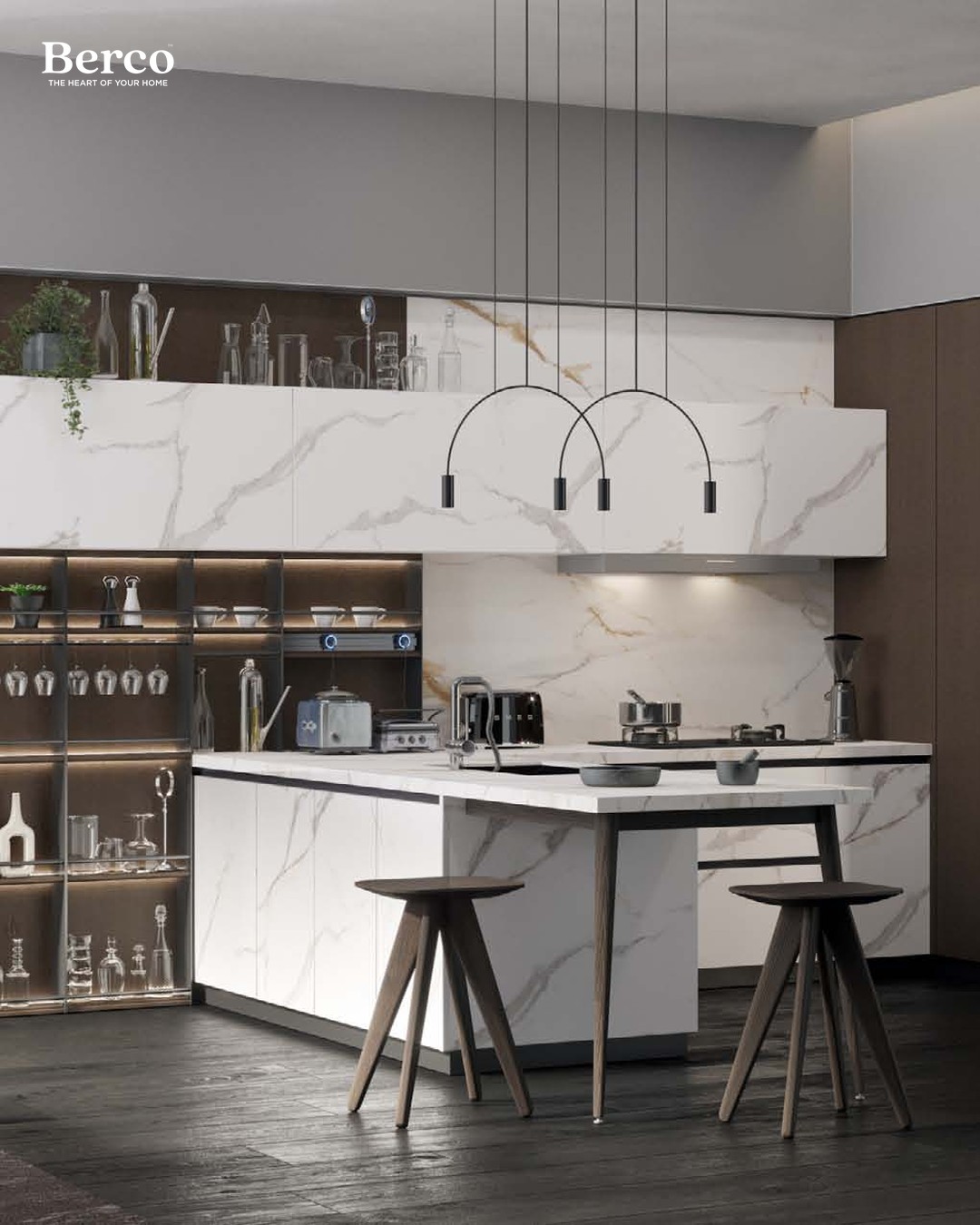 Open-plan kitchen with a marble island and walnut cabinetry — Berco design reference