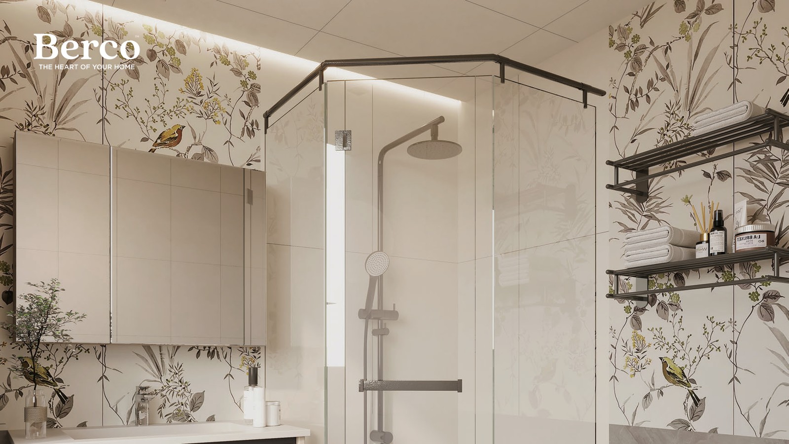 A wide cream mirror-fronted wall cabinet above a slim basin counter, on a botanical patterned wall beside a corner shower — Berco design reference.