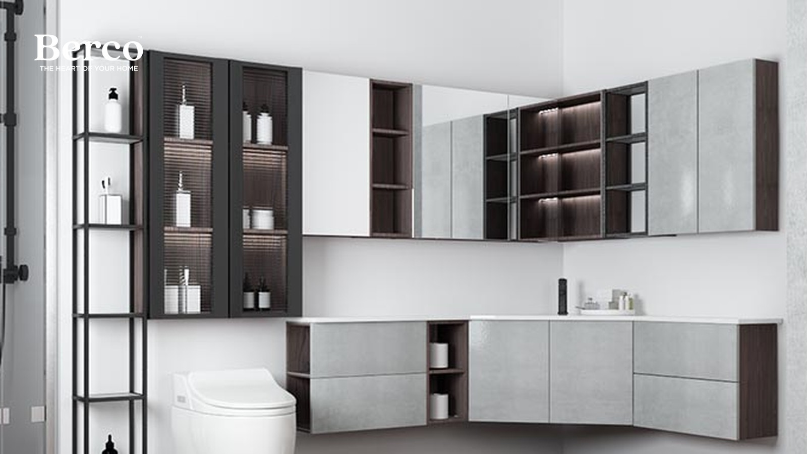 A gloss concrete-look wall-hung vanity turning a corner with a curved end, under mirrored and glass-fronted wall cabinets with lit shelves — Berco design reference.