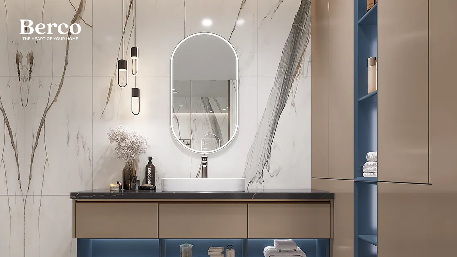 A taupe drawer vanity with a dark stone top over a blue open base shelf, beside a blue shelving column in a marble bathroom — Berco design reference.