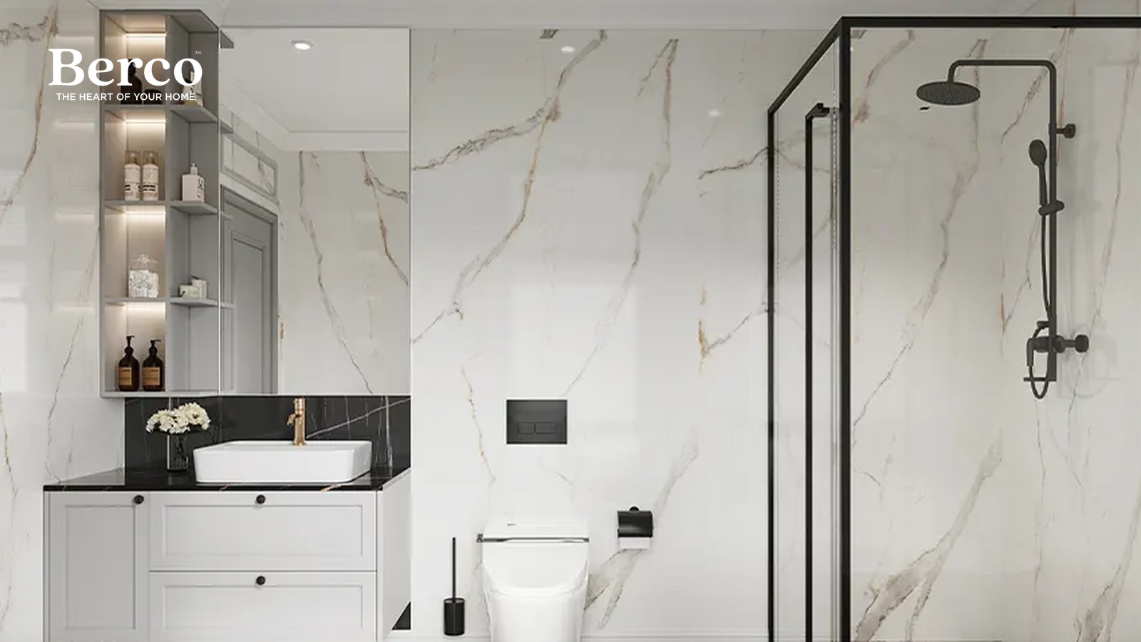 A white framed-panel vanity with a black stone top and black knobs, beside a tall lit open shelving column in a marble bathroom — Berco design reference.
