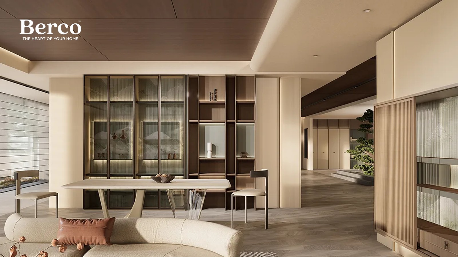 Dining table set in front of a walnut display wall with bronze-framed textured glass doors, lit shelves of ceramics and an open shelving grid — Berco design reference.