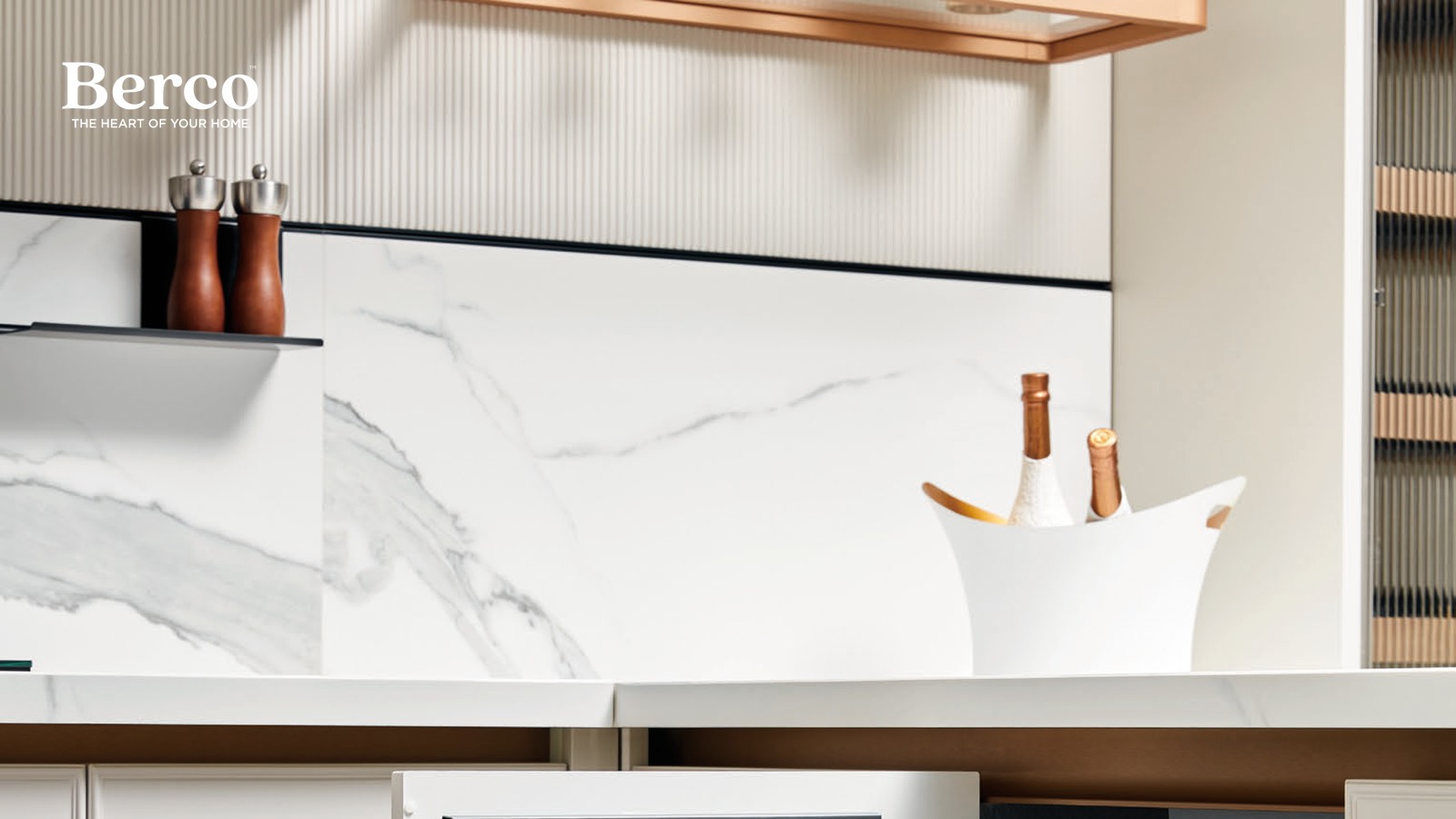 Door-mounted knife and utensil rack inside a cabinet against a marble surround — Berco design reference