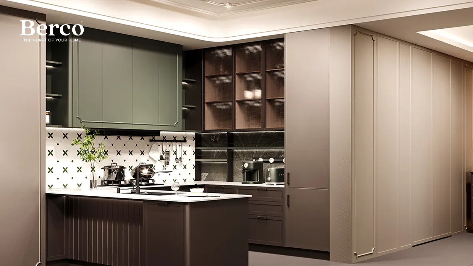 Compact open kitchen with sage green upper cabinets, bronze reeded glass display cabinets, patterned tile backsplash and a dark fluted peninsula with a white stone top — Berco design reference