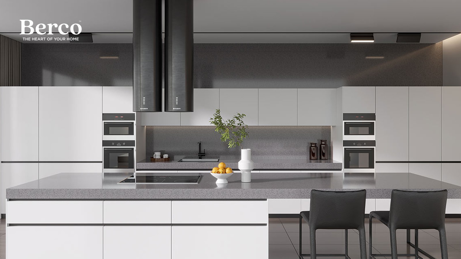 Large kitchen with handleless white cabinets, grey speckled stone counters and backsplash, two chimney hoods, twin built-in oven towers and a wide island with seating — Berco design reference