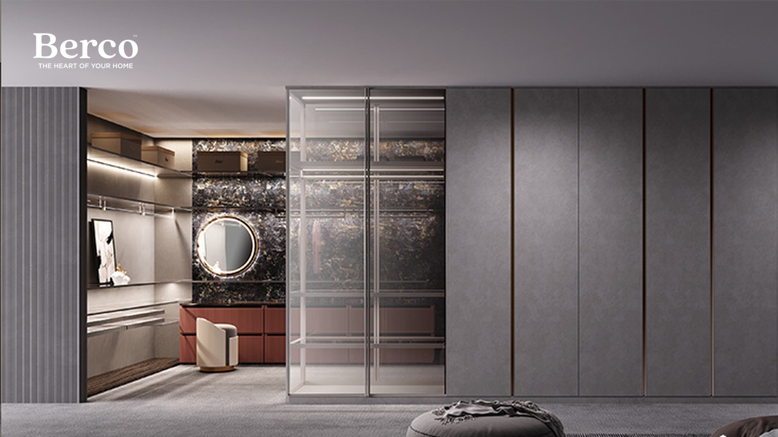 Darker grey dressing room with a marble feature wall, round mirror and a low bench — Berco design reference
