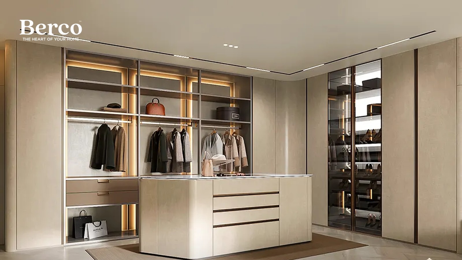 Open walk-in planned around a central drawer island with hanging, shelving and glass-front cabinets on the walls — Berco design reference