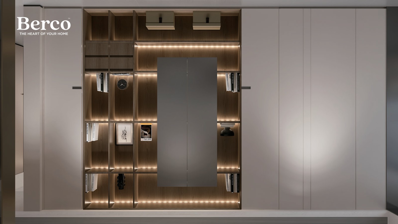 Walk-in wardrobe with backlit brass-framed open shelving around a central panel — Berco design reference
