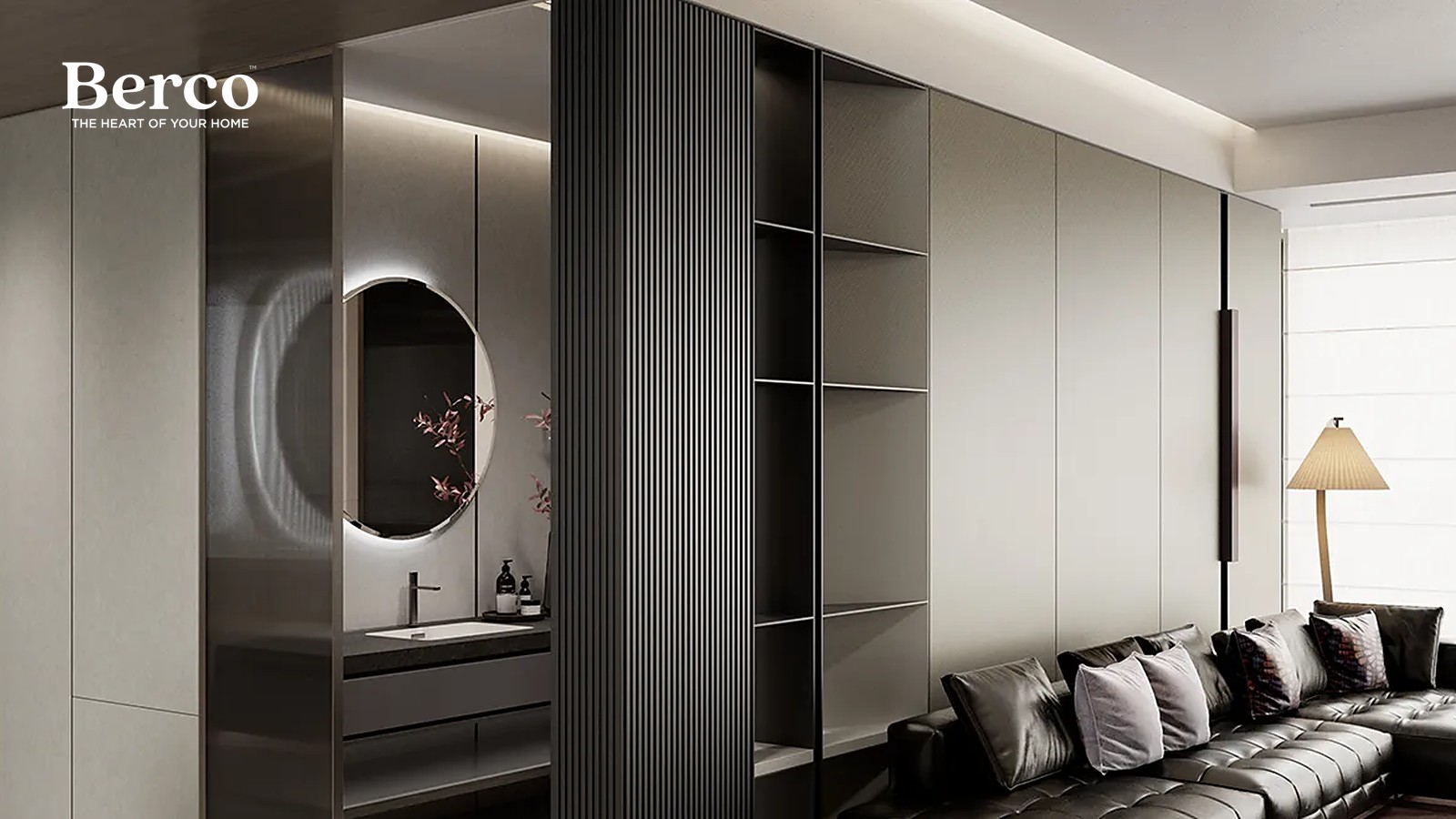 A living area lined with charcoal fluted panelling, a lit mirror niche and dark lacquer storage — Berco design reference.