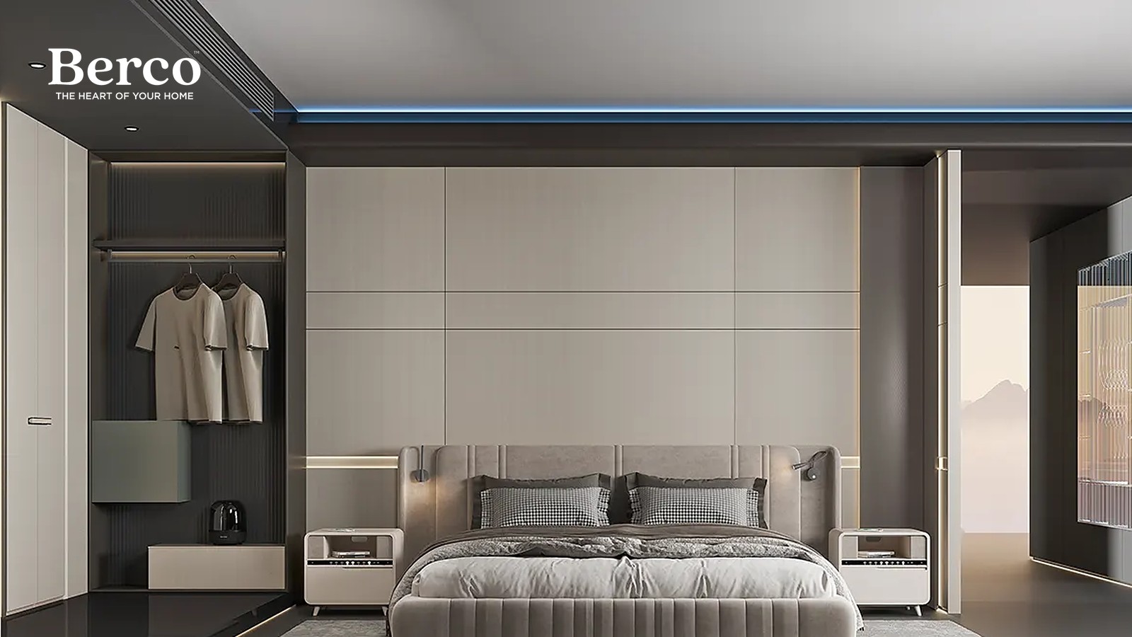 A bedroom wall of pale greige wardrobes with slim gold trims and an open hanging bay beside the bed — Berco design reference.