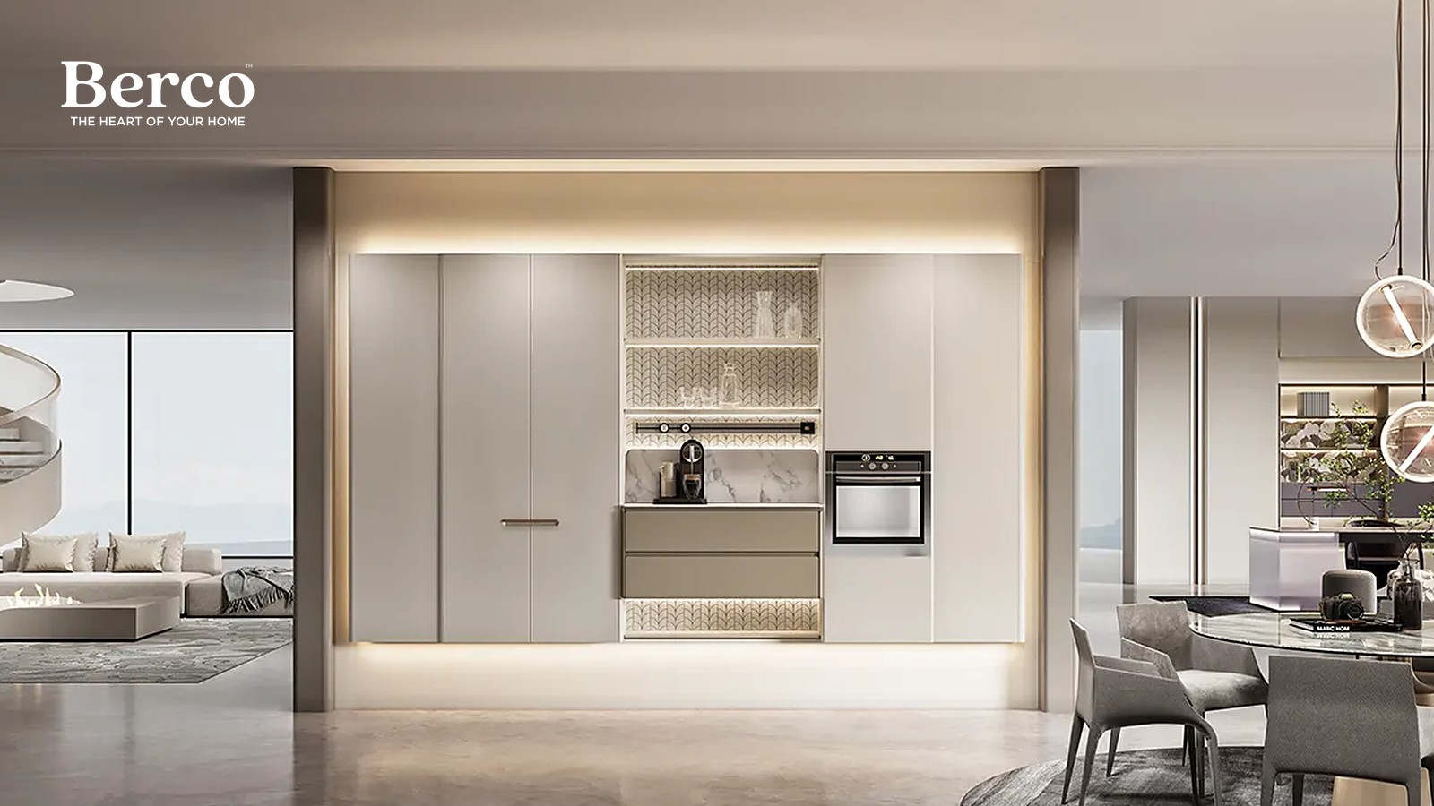 An open kitchen wall in ivory with a textured lit display niche and flush built-in appliances — Berco design reference.