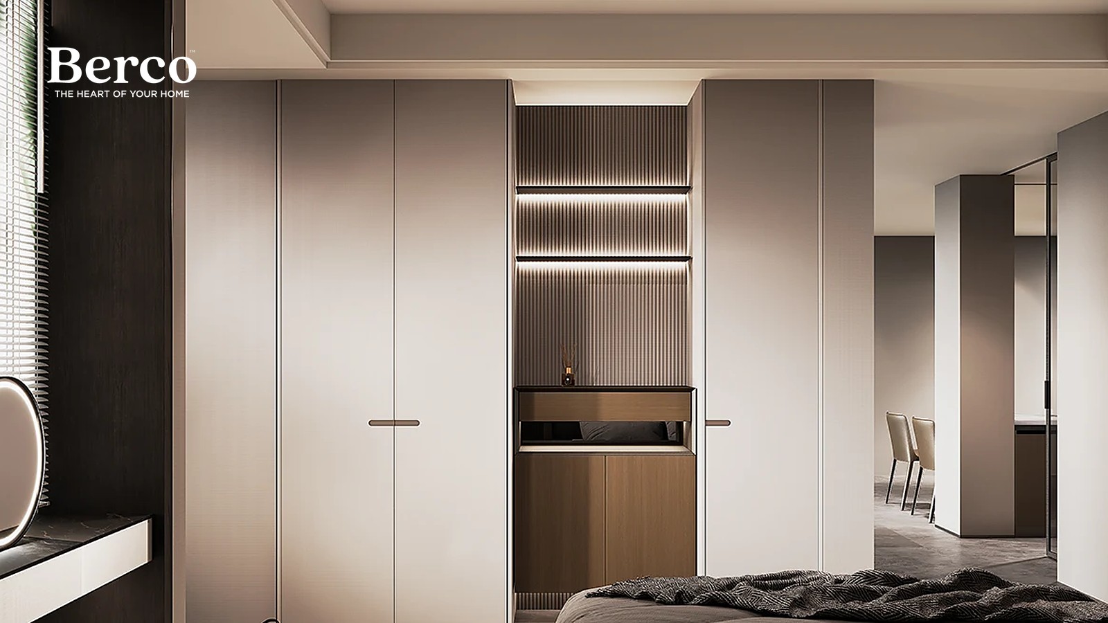 A bedroom wardrobe wall in warm taupe with a fluted wood niche and a lit open shelf — Berco design reference.